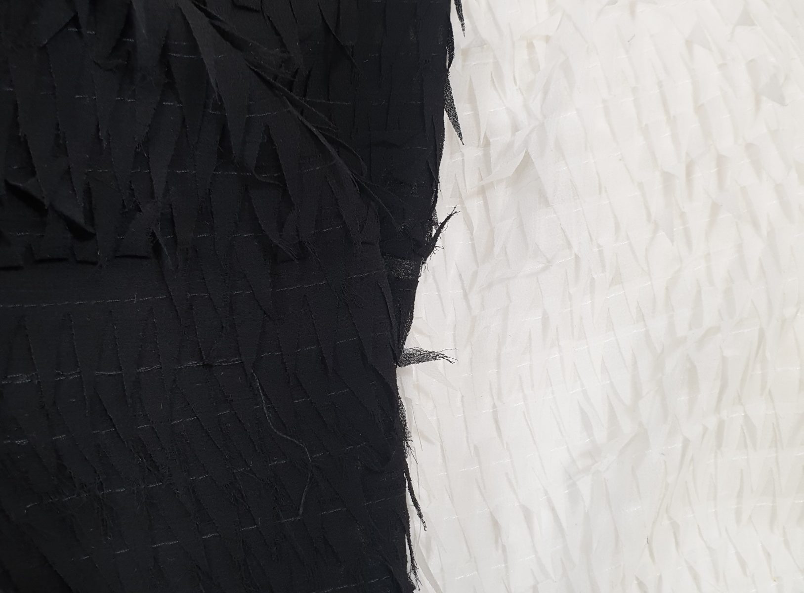 7823 fringed allover chiffon fabric for dress WIDTH cm145 WEIGHT gr250 - gr172 square meter - COMPOSITION 100 polyester - white 1000mts – black 700mts - price 11,5-14,95 eur