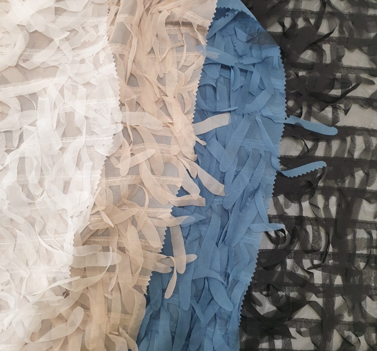 7825 allover fringed chiffon fabric for dresses WIDTH cm148 WEIGHT gr130 - gr87 square meter - COMPOSITION 100 polyester - white 1000mts – beige blue black 500mts each - price 12-15,6 eur